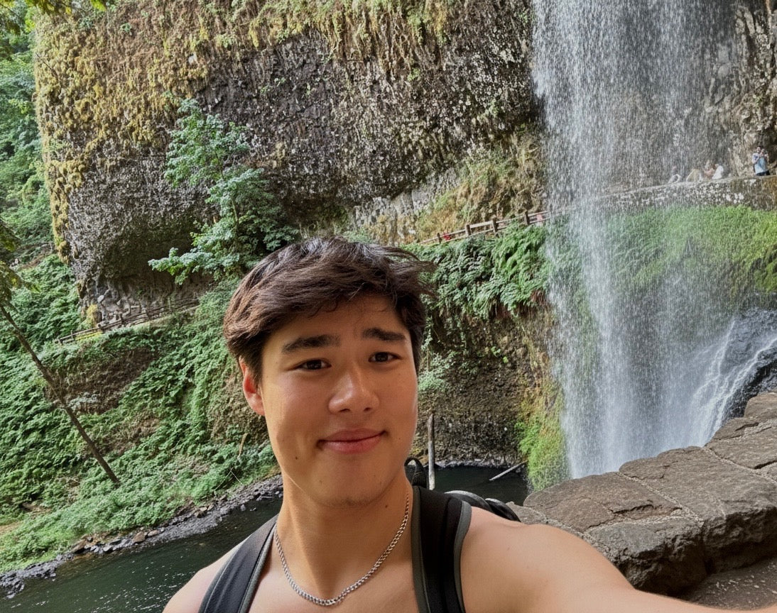 LINE 17 artist Zach Hirata on a nature hike with waterfall backdrop